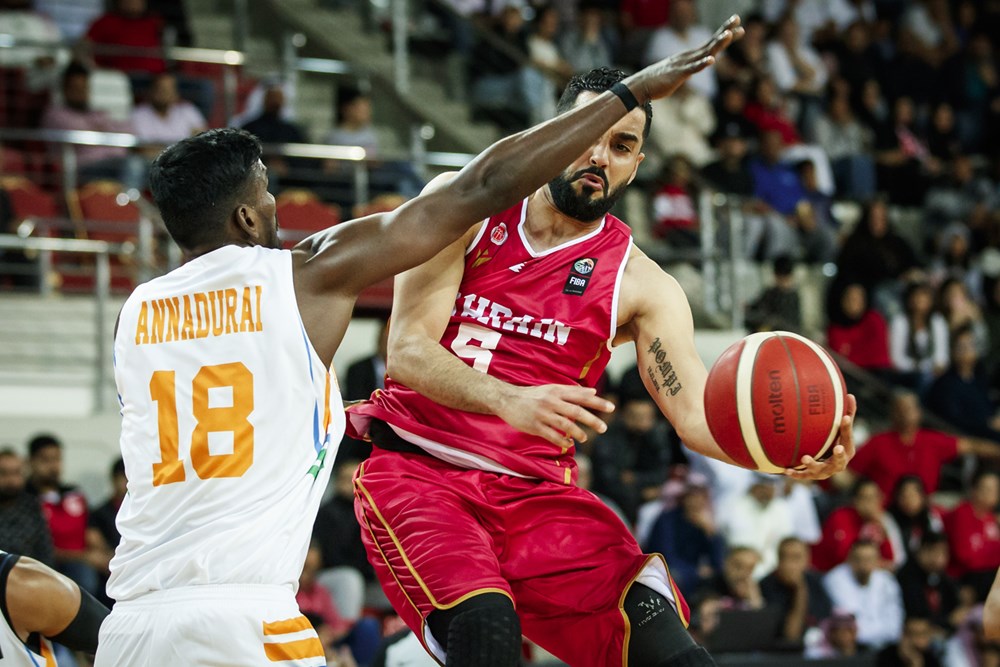 Aravind Annadurai looks to cut off Bahrain's attack in the FIBA Asia Cup qualifiers